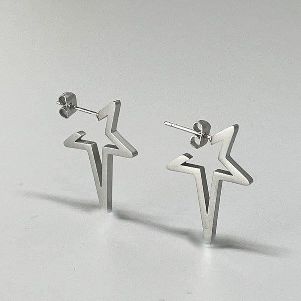 Stainless steel star earrings. Star shaped earrings. Silver star hoop in stainless steel.