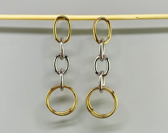 Thick stainless steel chain earrings. Gold and silver colored paperclip chain earrings. Steel paperclip chain
