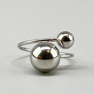 Stainless steel ball ring. Adjustable ring with 2 large balls.  Oversized stainless steel ring. Silver and gold ball ring.