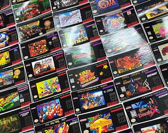 Etiquetas de repuesto para SNES: restaura tus etiquetas dañadas. Ideales para modificaciones, ROMs personalizadas, regalos, bromas o juegos meme. Diseños personalizados disponibles.