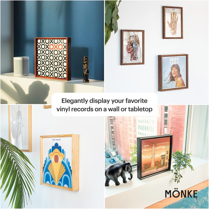 Op de afbeelding: Een verzameling ingelijste vinylplaten die aan een muur en op een tafel worden getoond. De frames zijn van hout en hebben verschillende kleuren en ontwerpen. De platen tonen verschillende muzikanten en genres.