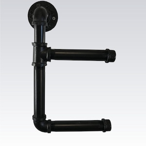 May include: Black metal pipe towel rack with two bars. The rack is mounted to a wall with a black metal flange.