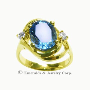 14K Blue Topaz Woman&#39;s Ring with Natural Diamonds Yellow Gold