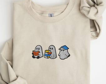 Sudadera bordada con fantasmas leyendo, bonito jersey de cuello redondo para amantes de los libros de Halloween, suéter de otoño para una temporada espeluznante, un acogedor regalo de libros y fantasmas para ella.