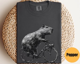 Capybara Riding Bike Shirt | Capybara Gift | Animal Lover Gift | Capybara Tee | Capybara T-Shirt | Funny Animal Lover T-Shirt | Rodent Shirt