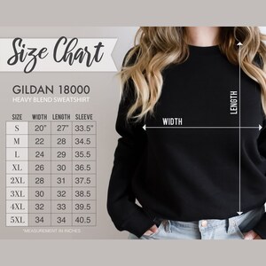 Pode incluir: Tabela de tamanhos para sweatshirts de mistura pesada Gildan 18000. A tabela mostra as medidas em polegadas para a largura, o comprimento e o comprimento da manga para os tamanhos S a 5XL.
