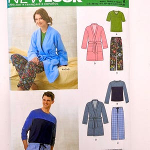 May include: New Look 6233 sewing pattern envelope featuring illustrations of loungewear including a robe, V-neck top, and pants. The pattern includes options for a blue robe, floral print pants, a green V-neck top, and a two-tone blue long-sleeve shirt.