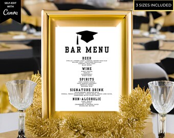 May include: A black and white printable bar menu sign with a graduation cap icon. The menu lists beer, wine, spirits, a signature drink, and non-alcoholic options. The sign is framed in a gold frame and is sitting on a table with gold and green decorations.