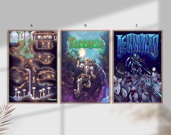 May include: Three framed posters featuring artwork from the video game Terraria. The posters showcase various scenes, including a knight, a detailed underground map, and a winter scene with snowmen. The posters are in wooden frames.
