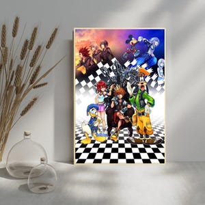 May include: Framed artwork featuring characters from the Kingdom Hearts video game series. The artwork showcases a variety of characters, including Sora, Donald Duck, Goofy, and Mickey Mouse, set against a checkered background.