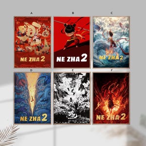 May include: Six framed posters featuring artwork from "NE ZHA 2". The posters have a variety of color schemes, including red, blue, and black. Each poster has the title "NE ZHA 2" at the bottom. The artwork depicts characters and scenes from the movie.