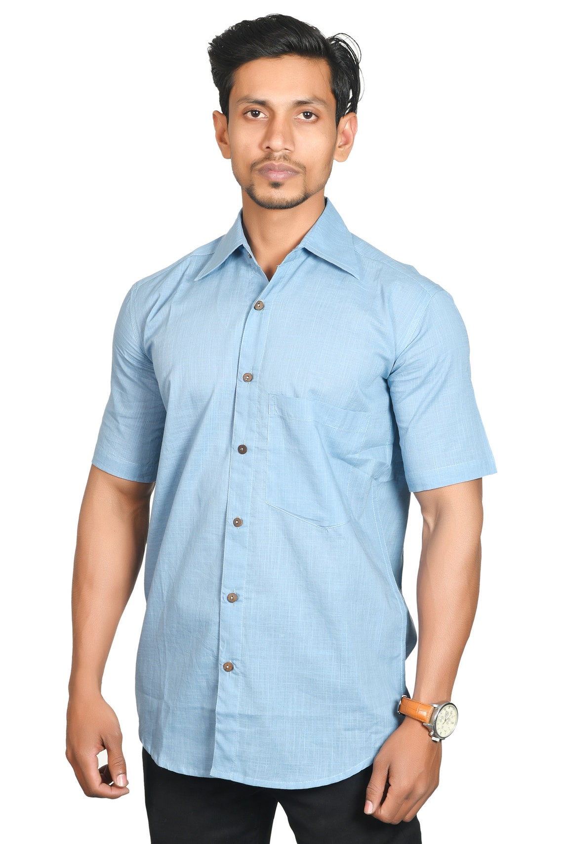 sky blue shirt and grey pants