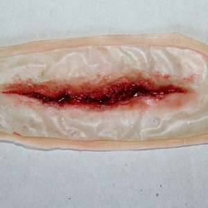 Shallow Linear Gash Wound Prosthetic Film TV, special effects makeup (SFX), medical, first aid training, forensic prop anatomy morbid cut