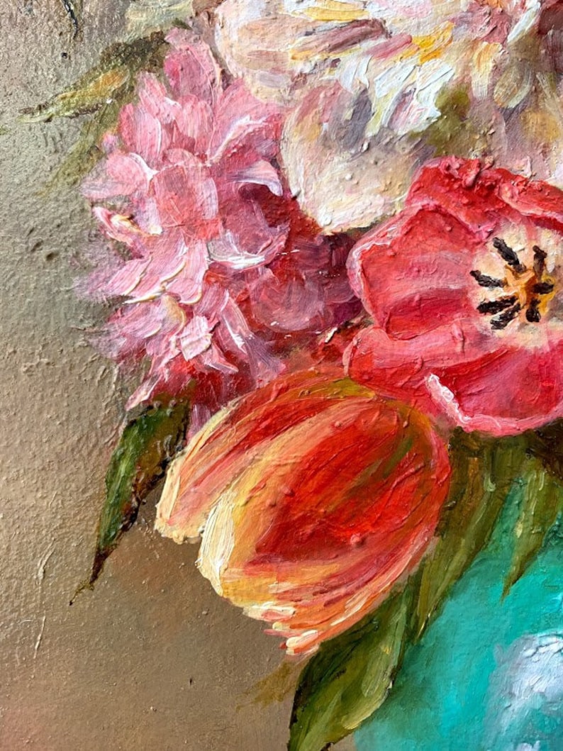May include: A close-up of a still life painting featuring a bouquet of pink, white, and red flowers in a teal vase. The flowers are painted with thick brushstrokes, giving the painting a textured look.