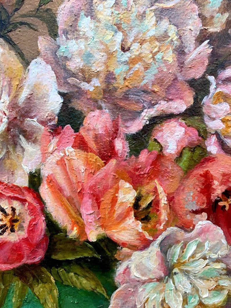 May include: A close-up of a still life painting featuring a bouquet of pink, white, and red flowers. The flowers are painted in a realistic style with visible brushstrokes. The painting is set against a dark background.