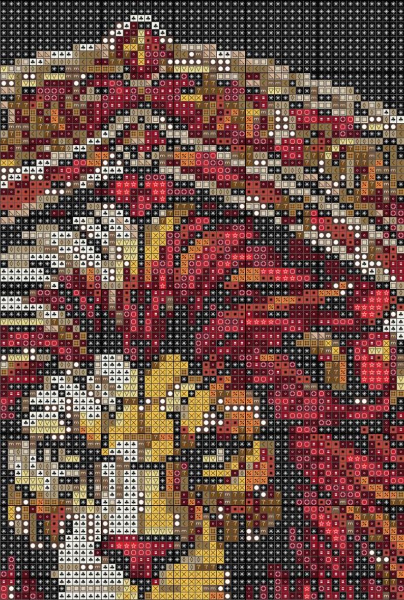 May include: A detailed cross-stitch pattern in red, gold, brown, and black. The design incorporates geometric shapes, symbols, and text, creating a textured and intricate visual effect. The overall theme is abstract and decorative, suitable for crafting.