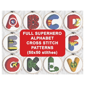 May include: A set of 8 cross stitch patterns featuring superhero characters. Each pattern is a letter of the alphabet, from A to V, and is designed in a 50x50 stitch format. The patterns are displayed in white embroidery hoops against a white background.