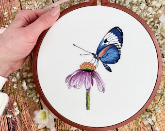 Enchanting Hand-Embroidered Dark blue nymphalid butterfly on Purple Flower Hoop Art, Echinacea purpurea (corn flower), Heliconius cydno