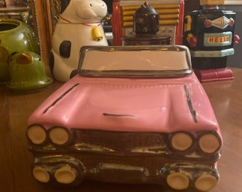 Vintage pink 1959 Cadillac convertible cookie jar made by North American Ceramics in 1986