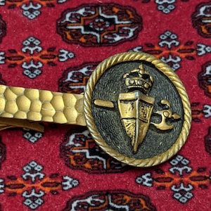 Vintage Gold Tone Battle Axe Tie Bar