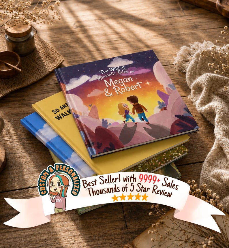 May include: A stack of three hardcover books. The top book features a colorful illustration of two people under a starry sky with the text The Wild & Romantic Tales of Megan & Robert. A banner overlay displays the text Custom & Personalized Best Seller! with 9999+ Sales Thousands of 5 Star Review.