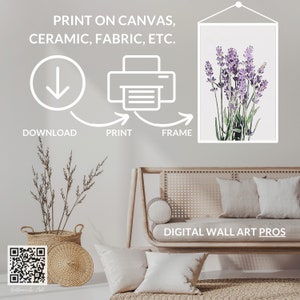 Peut inclure: Un t&eacute;l&eacute;chargement num&eacute;rique d'une peinture &agrave; l'aquarelle de fleurs de lavande dans un cadre blanc. L'image est affich&eacute;e sur un mur au-dessus d'un canap&eacute; brun clair avec des coussins blancs. Le texte "IMPRIMER SUR TOILE, C&Eacute;RAMIQUE, TISSU, ETC." est au-dessus de l'image. Le texte "T&Eacute;L&Eacute;CHARGER, IMPRIMER, ENCADRER" est sous l'image. Le texte "DIGITAL WALL ART PROS" est sous le canap&eacute;.