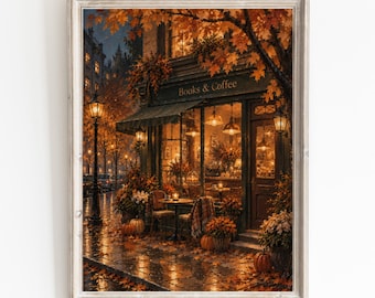 May include: A framed art print depicting a storefront labelled Books & Coffee at dusk. The scene features warm golden lighting, autumn foliage, orange pumpkins on the pavement, and a wet street reflecting the glow of streetlamps and shop windows.