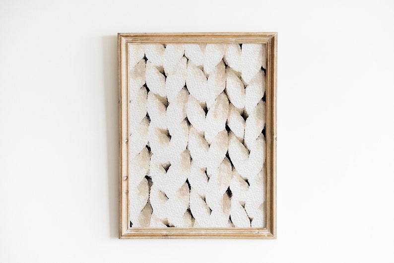Peut inclure: Une impression d'art abstrait encadr&eacute;e avec un fond blanc et un motif de formes beiges et brunes. Le cadre est en bois clair.