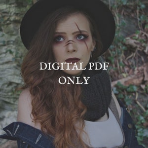 May include: A woman with long auburn hair and dramatic makeup, wearing a black hat and a dark gray scarf. The text "DIGITAL PDF ONLY" is overlaid on the image. The background features foliage.