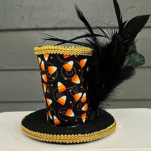 Mini Halloween Top Hat, Candy Corn Fabric Wreath Accent, Black Feather Decor