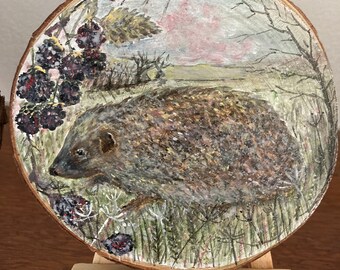 Hedgehog painted on a wood slice