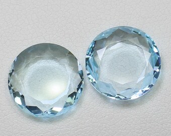 Natural Sky Blue Topaz Pair: Round Faceted Gemstones, 8.55 Carats