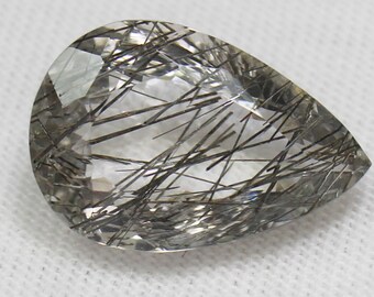 Faceted Black Rutile Quartz Pear: 6.35 Carat Gemstone