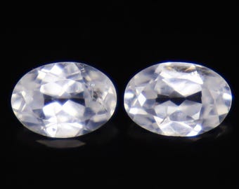 Faceted White Zircon Pair: Oval Gemstones, 2.35 Carats