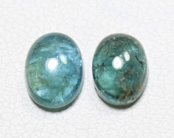 Blue Tourmaline Cabochon Pair: 2.20 Carats, 7x5 mm Oval Gemstones