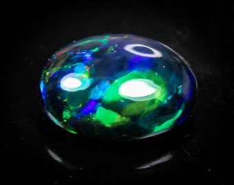 Oval Ethiopian Black Opal Cabochon Stone: Natural Green Fire, 6.30 Cts (15x11x7 MM)