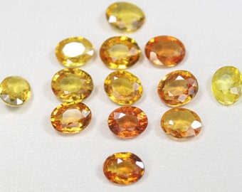 Natural Orange Sapphire Lot: Faceted Oval Gemstones, 4.60 Carats