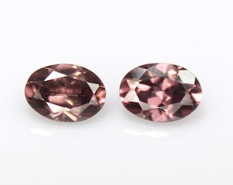 Faceted Brown Zircon Pair: 2.55 Carats, 7x5mm Oval Gemstones