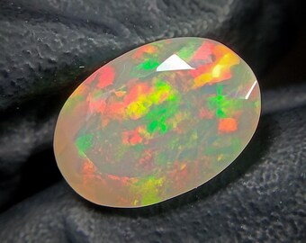 Faceted Ethiopian Opal: Oval Welo Fire Opal Gemstone (11x8x5mm)
