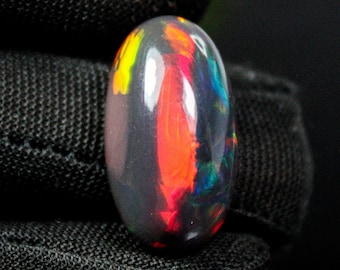 Oval Ethiopian Black Opal Cabochon Stone: Natural Red Fire (13.15 Cts, 24x13x9 MM)