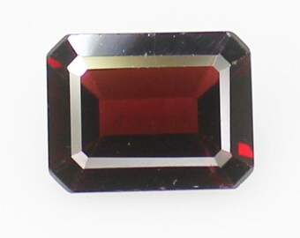 Faceted Red Garnet Gemstone: Emerald Cut, 2.85 ct