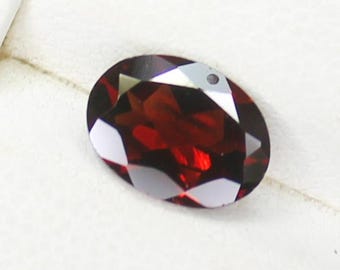 Faceted Red Garnet Gemstone: Oval Cut, 1.35 ct, 8x6x4 mm