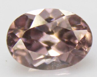 Faceted Brown Zircon: Oval Gemstone, 1.55 Carats, 7x5x4 mm