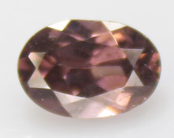 Faceted Brown Zircon: Oval Gemstone, 1.30 Carats, 7x5x3 mm