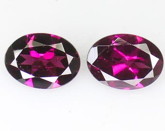 Faceted Rhodolite Garnet Pair: Oval Pink Gemstones, 1.85 Carats