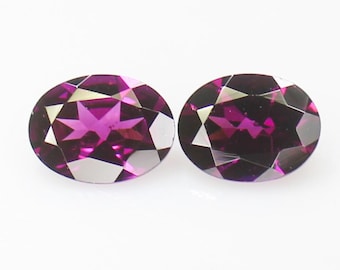 Faceted Rhodolite Garnet Pair: Oval Cut Pink Gemstones, 2.90 Carats