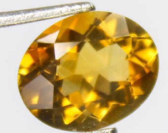 Faceted Citrine Gemstone: Natural Yellow Oval Stone, 2.35 Carat