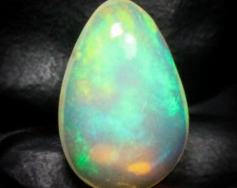 White Ethiopian Opal Cabochon Pear Shape: 2.30 Carats, 13x8x5 mm