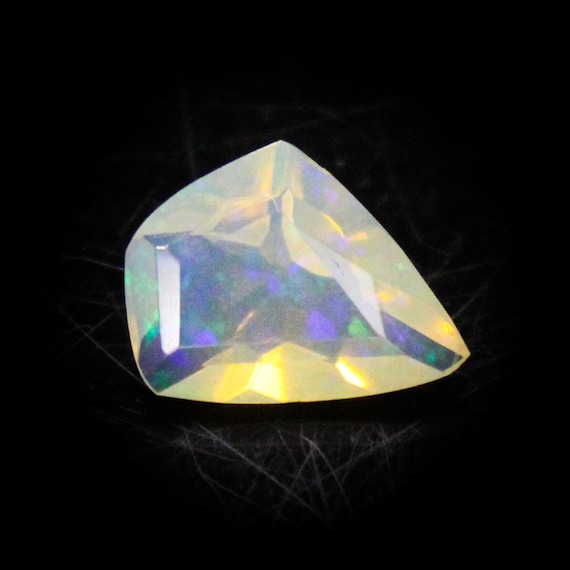Faceted Ethiopian Opal Gemstone: 1.80 Carat Fancy White Opal for Jewelry Making