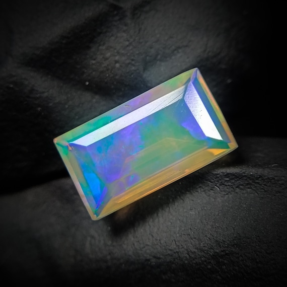 Natural Ethiopian Opal Faceted Rectangle: 1.50Ct Welo Fire Opal Gemstone